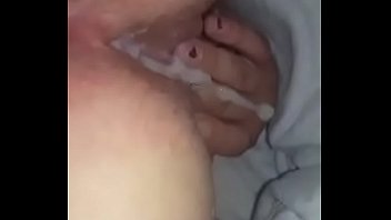 Doggie style fucking leads to a nice creampie which oozes out of her pussy onto the bed