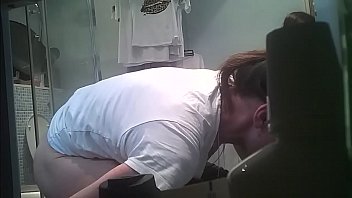 Hidden camera Ukrainian wife washer her hairy cunt with leggings half down